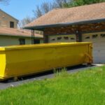 Large dumpster rental in driveway for home projects and cleanouts in Sanford, FL