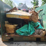 Dumpster full of furniture 